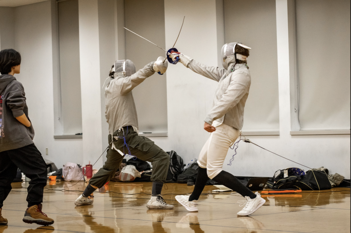 Friendly competition at fencing club